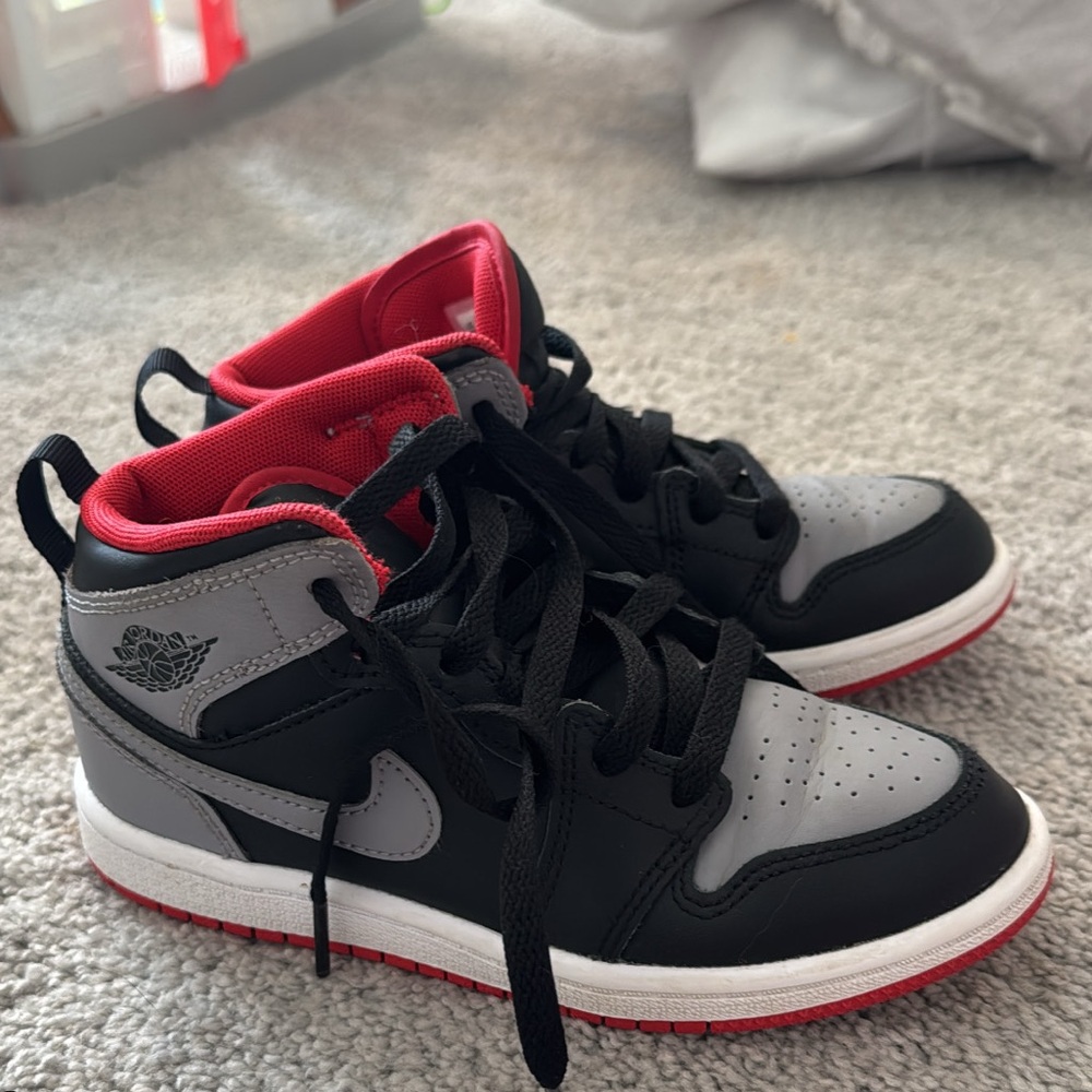 Jordan Kids Black and Gray Sneakers with Red Highlights